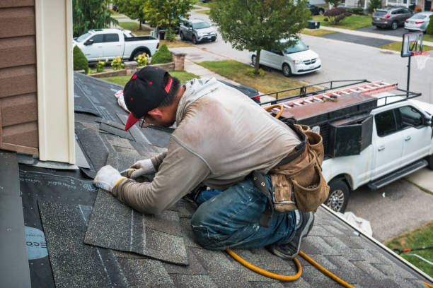 Professional Gutter Repair And Installation technician working in Montezuma, IA